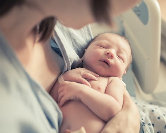 newborn potentially with a lip tie