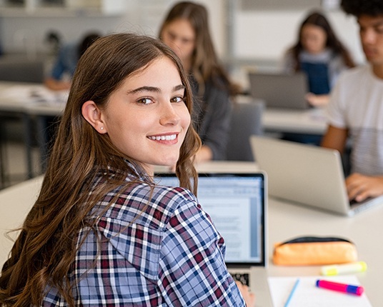 Teen smiling at school