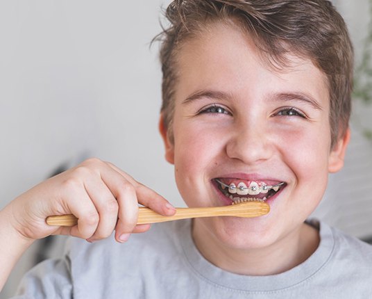 Boy brushing his teeth