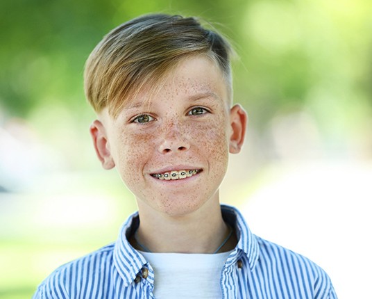 Boy smiling with braces